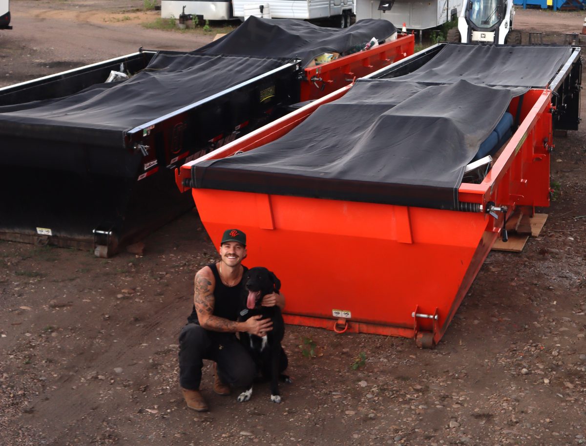 Eric and Mosley with the Mo's Hauling roll-off dumpster fleet